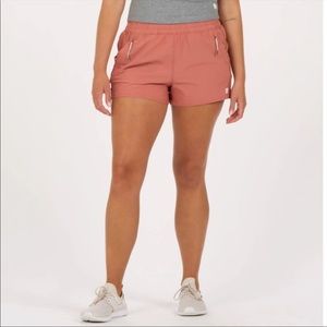 Vuori Dash shorts.  New with tags.              Color: Cinnamon Size : XS
